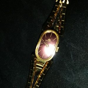 swiss made, manual wind, gold, Bucherer ladies tim